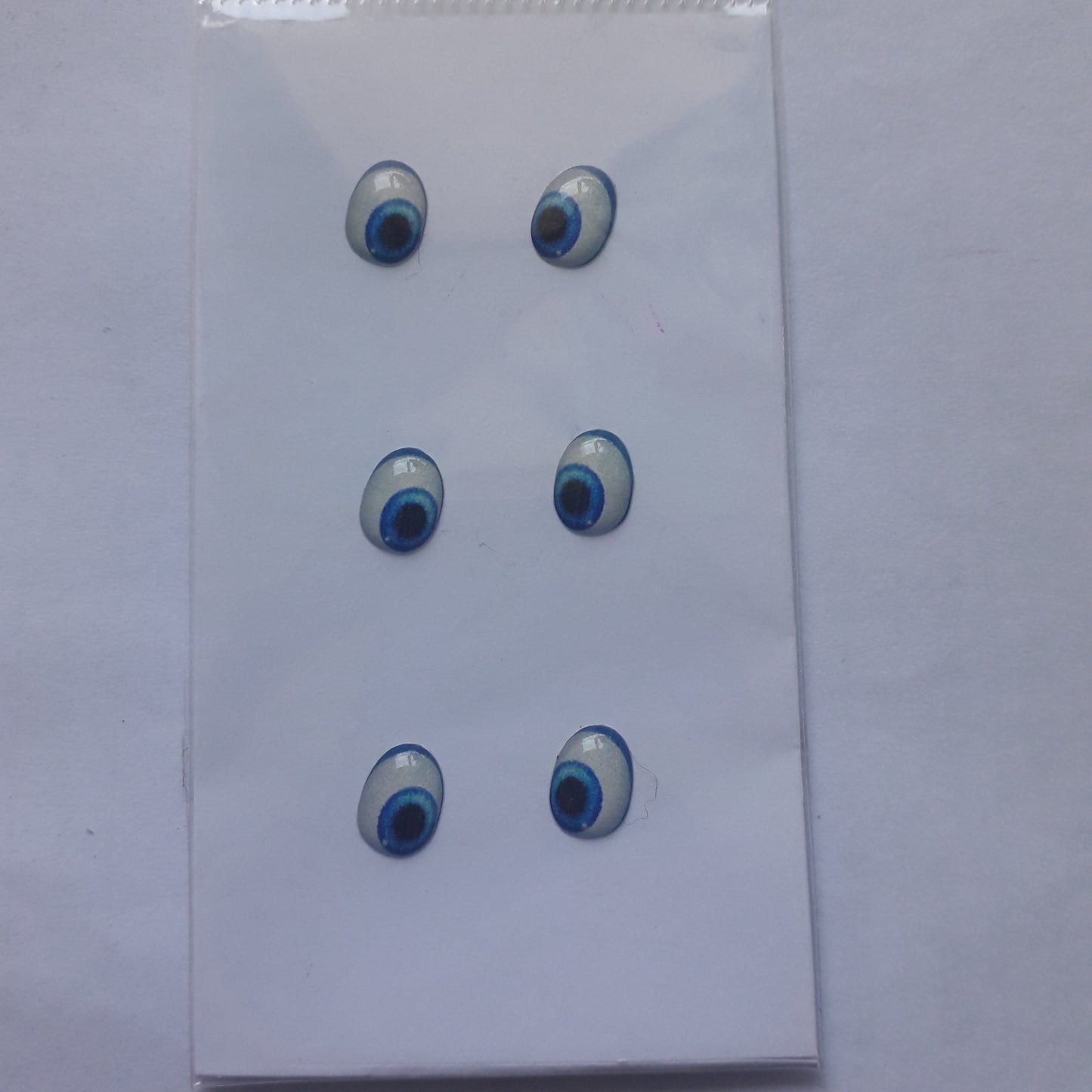 Ojitos adhesivos 3D azules-celestes