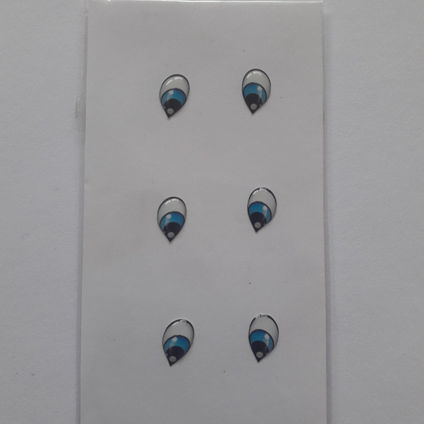 Ojitos adhesivos 3D azul lagrima