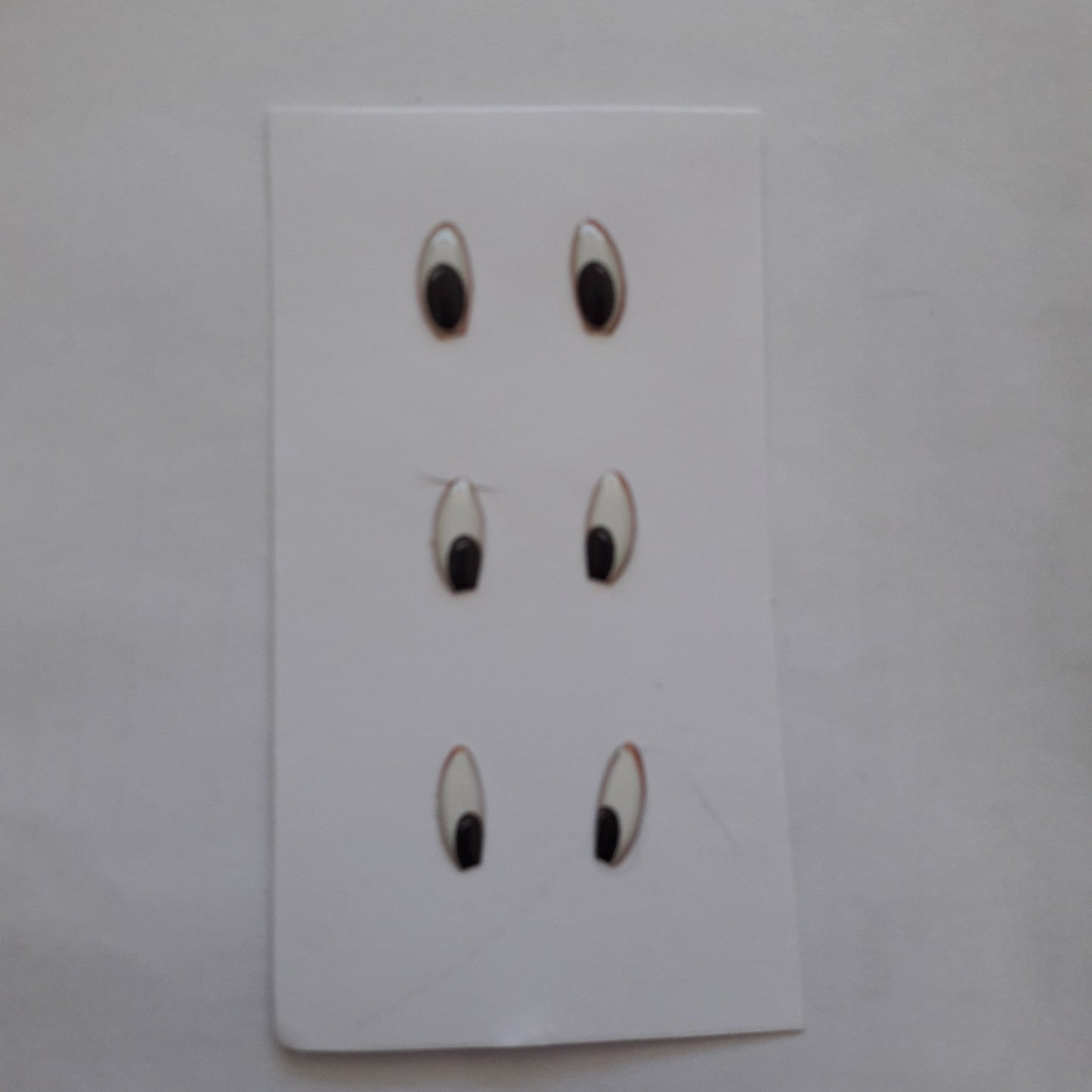 Ojitos adhesivos 3D negros