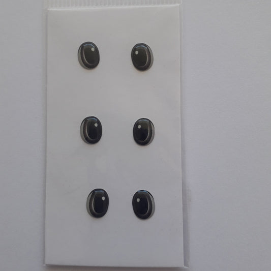 Ojitos adhesivos 3D  gris acero ovalo