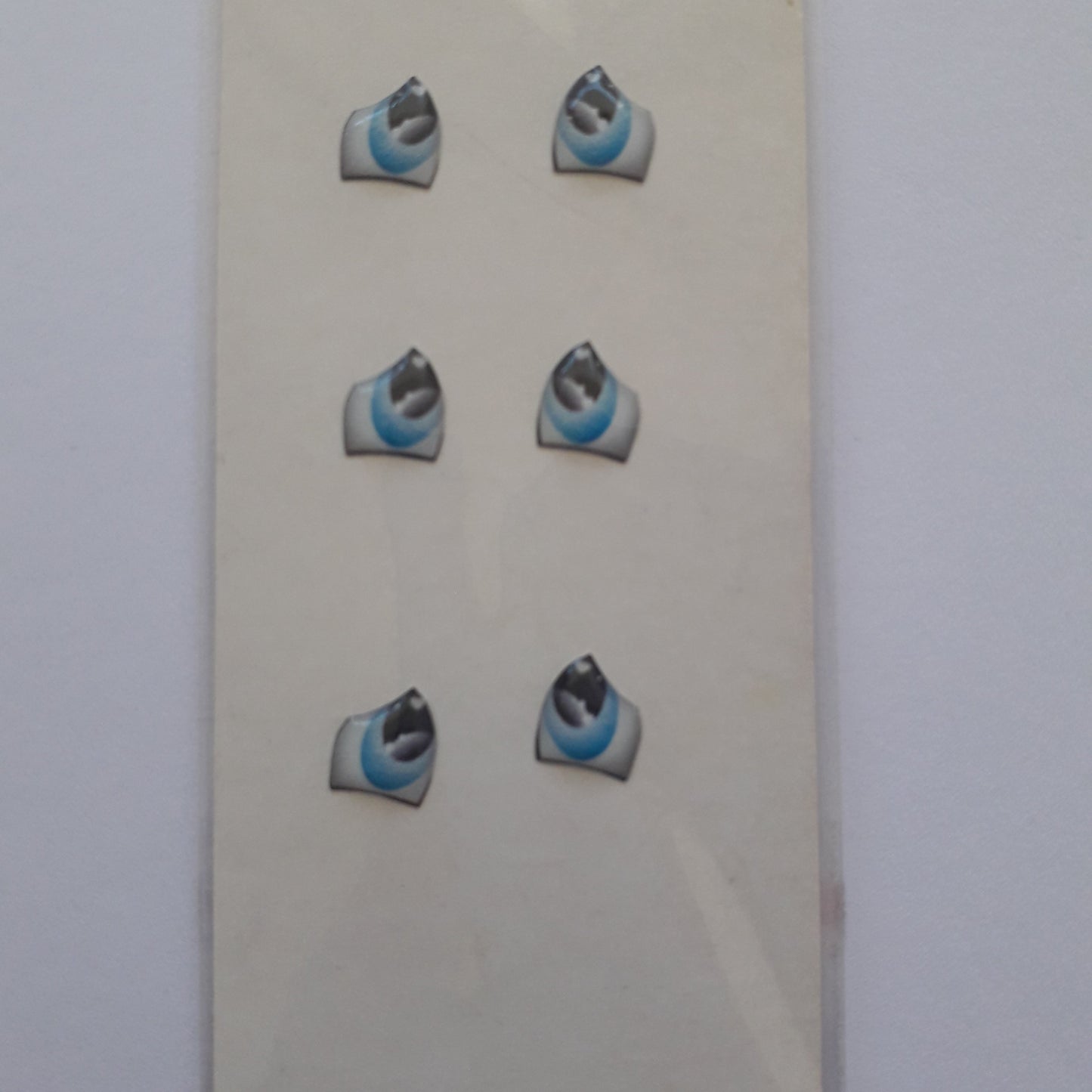 Ojitos adhesivos celeste /máscara