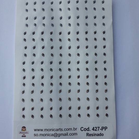 Ojitos adhesivos resinados Monicarts 427-PP en plancha